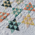 Jemmas triangle star quilt with fancy custom quilting